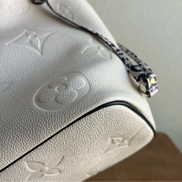 💸 SOLD • Louis Vuitton Wild at Heart Neverfull MM Cream Empreinte - Picture 10 of 16